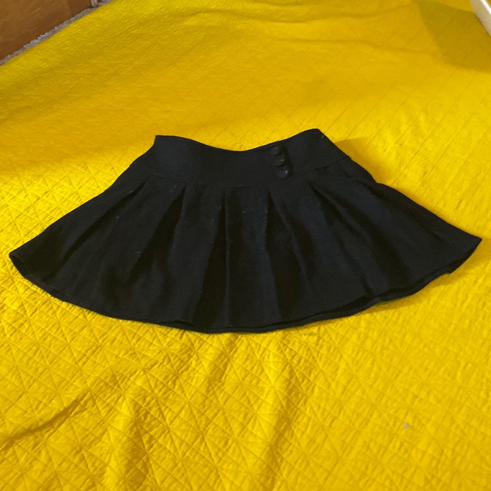 Mini black ChouYatou skirt with decorative buttons